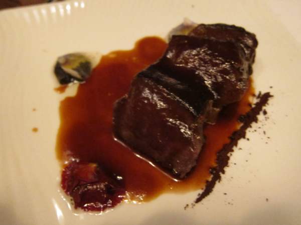 Loin of Venison with its own sauce, Cocoa Powder and Griottines