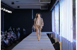 Model walking on runway