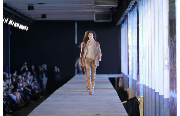 Model walking on runway