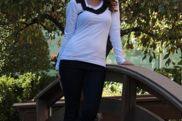 Kristen Colapinto wearing a Wolf & Harrison shirt.
